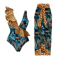 Women's solid colour spaghetti strap one-piece swimsuit with a matching skirt laid flat