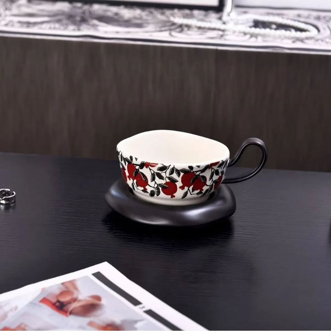 Antique style ceramic coffee cup and saucer set with medieval pattern, 210ml capacity, in black or orange.