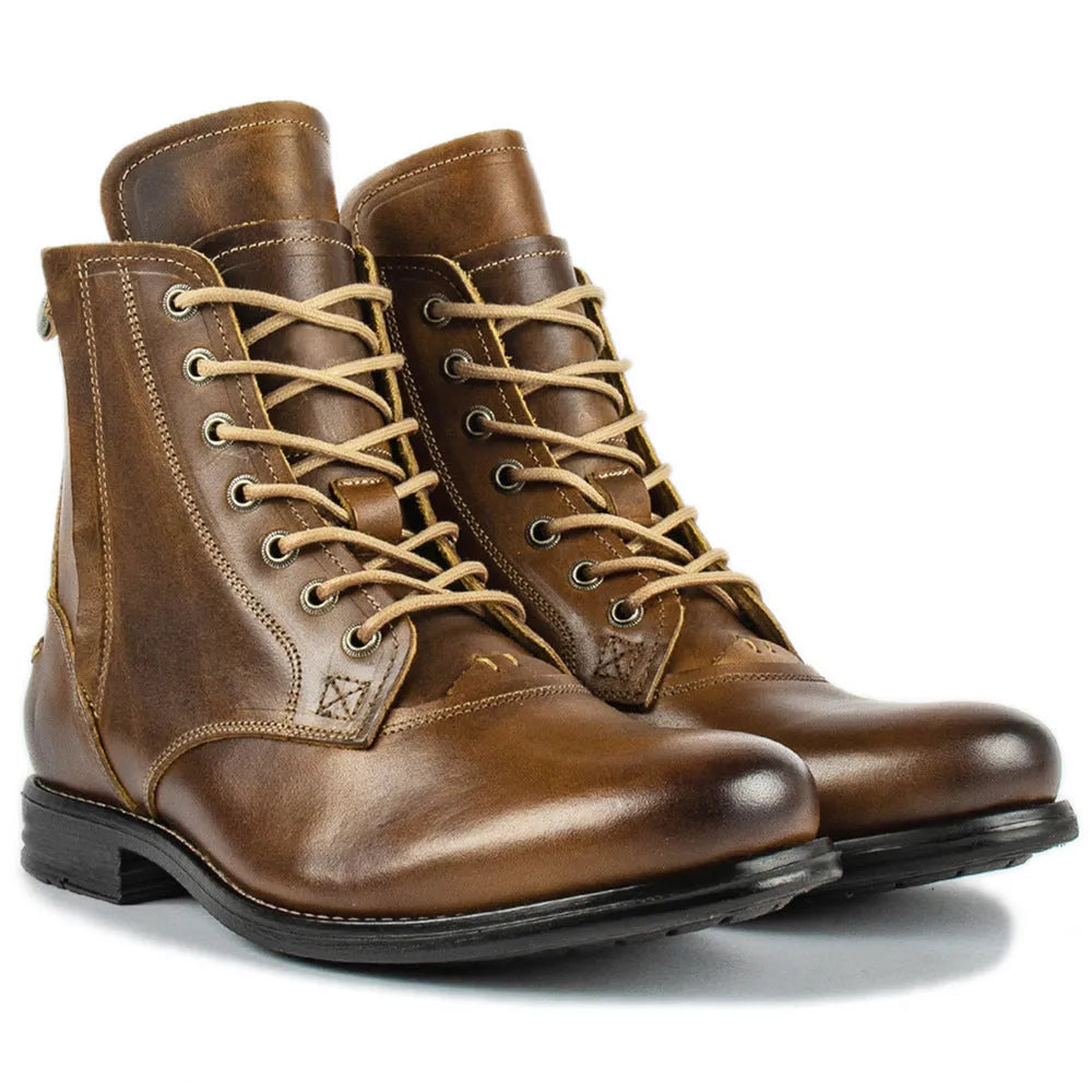 Men's black and brown two-tone leather ankle boots with side zip and low heel.
