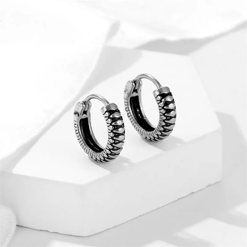 Silver geometric stainless steel earrings with retro twist stripe design