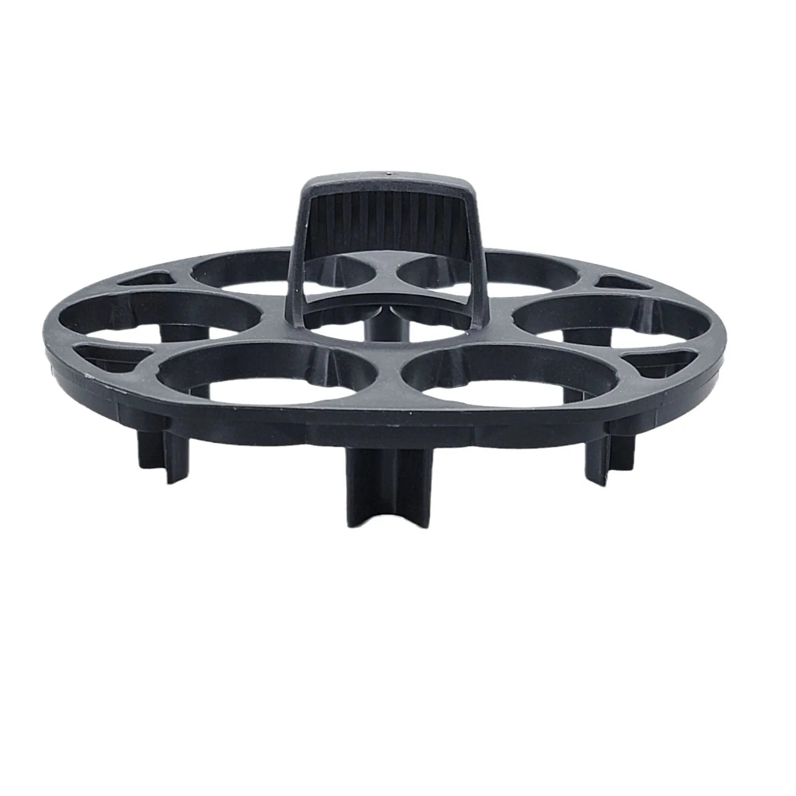 Black plastic egg holder cooking basket rack with retainer on a kitchen counter.