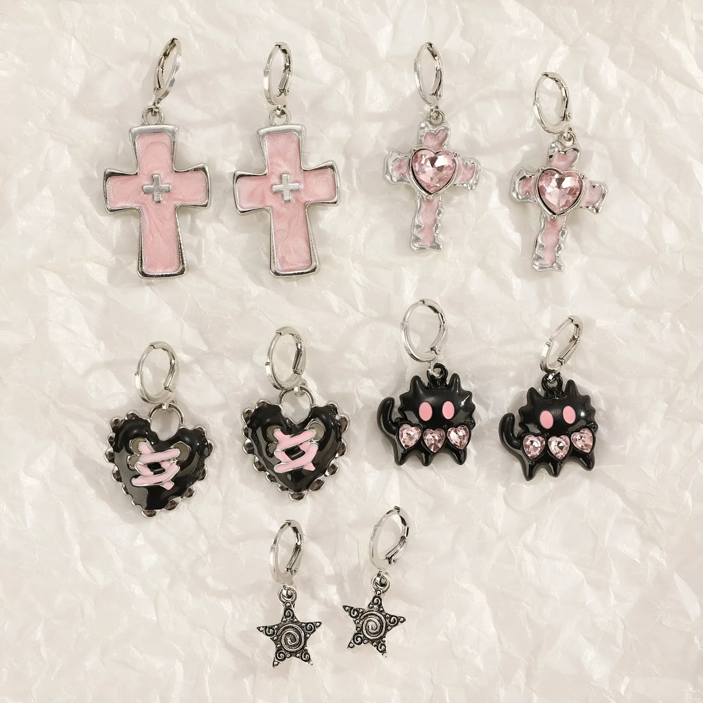 Women's alloy earrings with cross crystal design in antique silver, white, and bright black cat colour options
