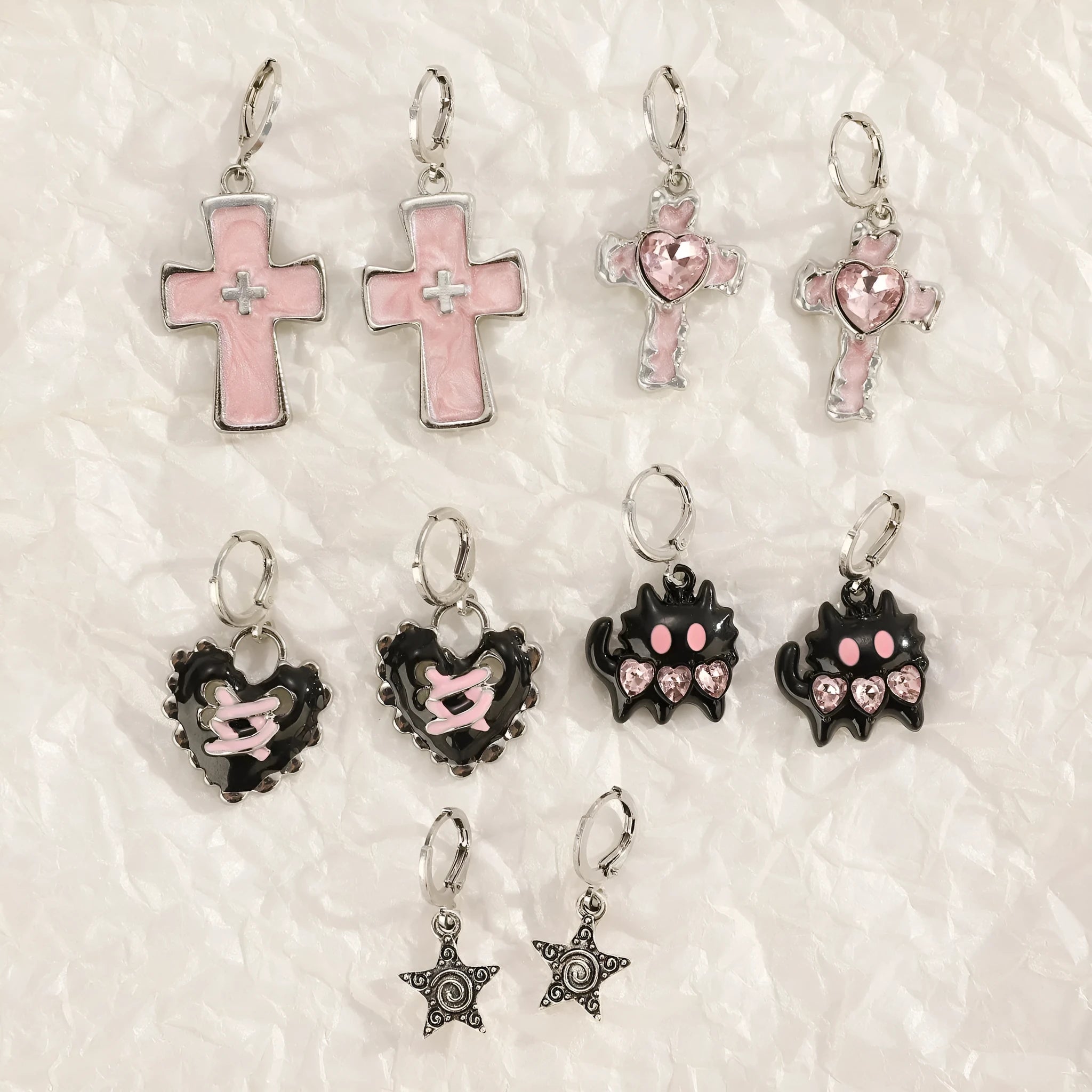 Women's alloy earrings with cross crystal design in antique silver, white, and bright black cat colour options