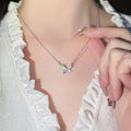 Colourful butterfly pendant necklace on alloy cross chain for women
