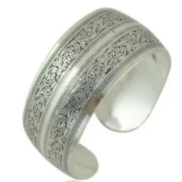 Ethnic carved open Miao silver bracelet with Roman shape in turtle colour option showing detailed openwork carving