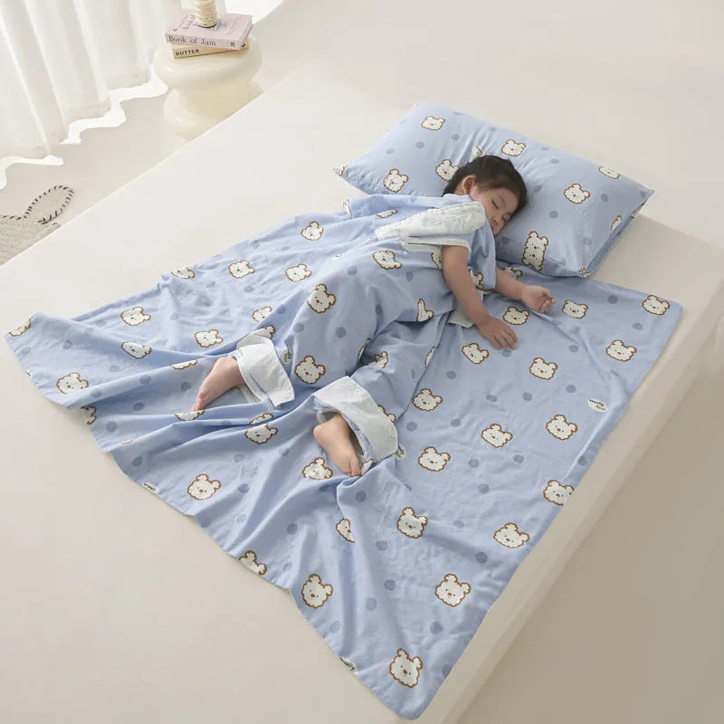 Anti-kick sleeping bag blanket in a choice of colours and sizes on a bed.