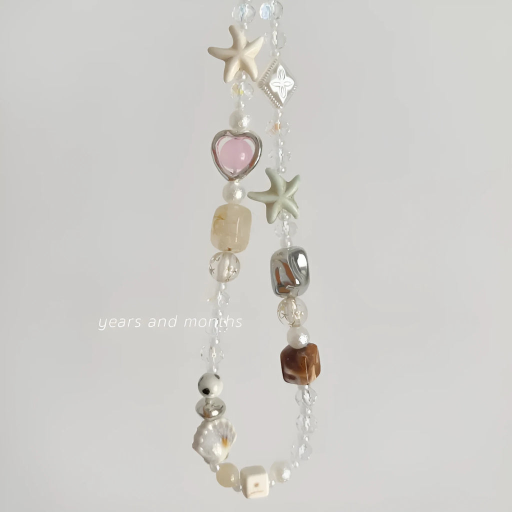 Island sweetheart coloured alloy beaded mobile phone charm with bohemian style