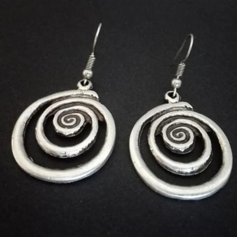 Silver geometric spiral distressed earrings with a retro national style design.