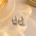French refined Doudou water drop titanium steel ear studs in gold real gold plating affordable luxury style