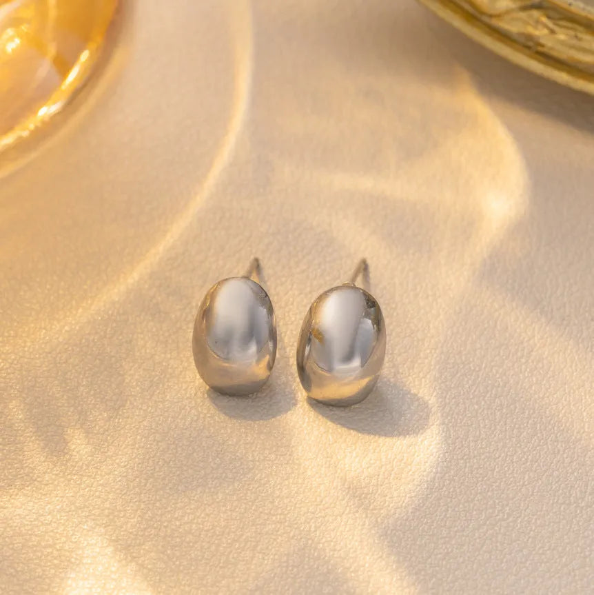 French refined Doudou water drop titanium steel ear studs in gold real gold plating affordable luxury style
