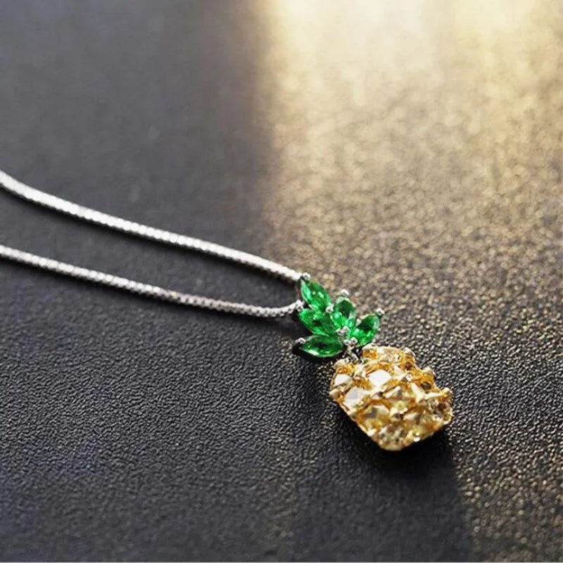 Silver-plated women's necklace with a geometric pineapple diamond charm in a copper white gold finish.