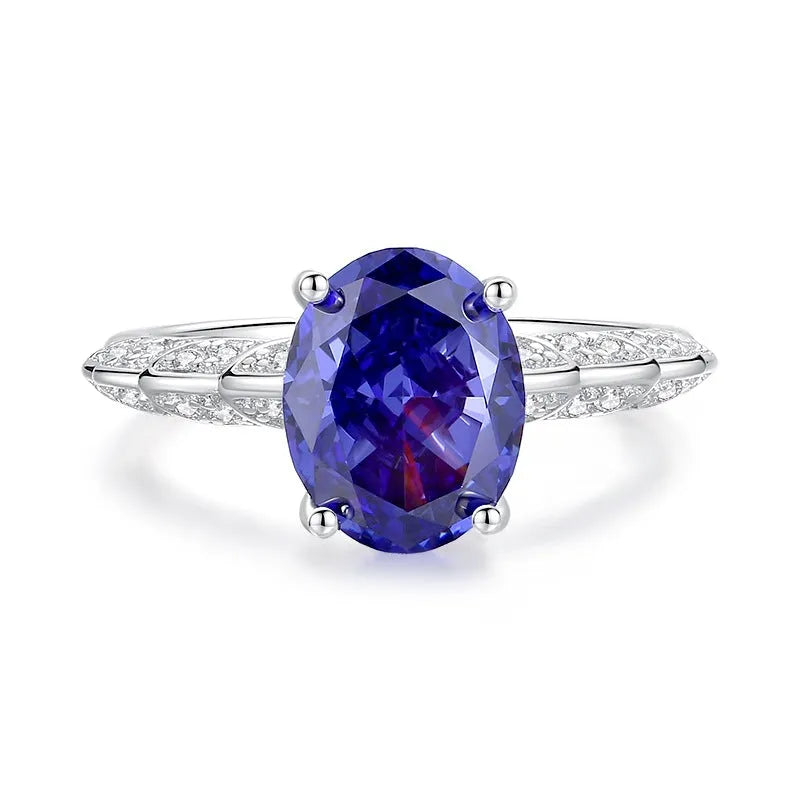 Heart-shaped sterling silver ring with a detailed ice flower cut colour zircon centre stone.