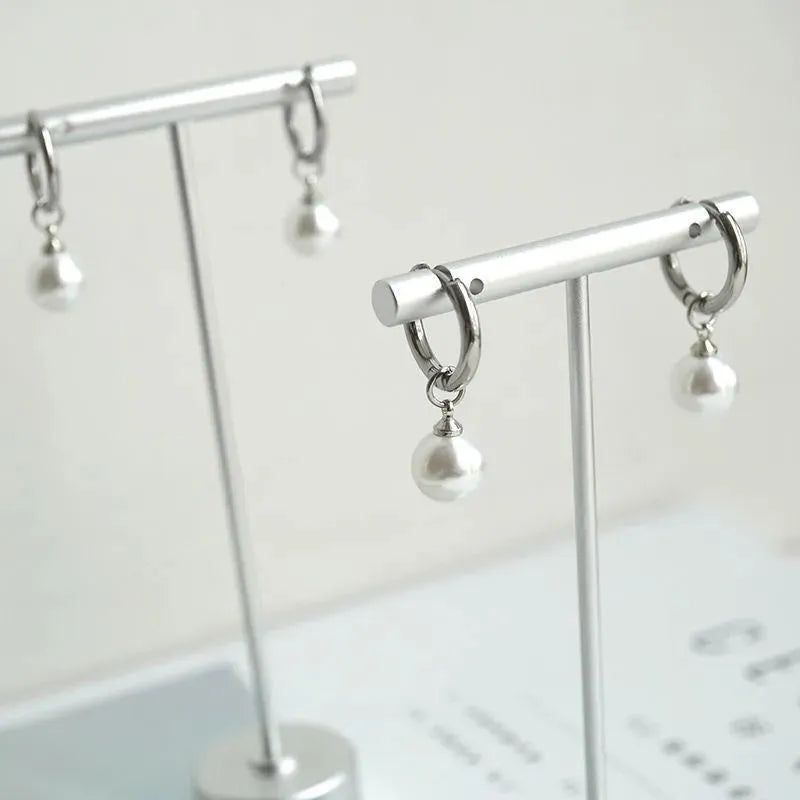 Pearl geometric drop earrings with titanium steel posts and alloy construction in hip-hop inspired design