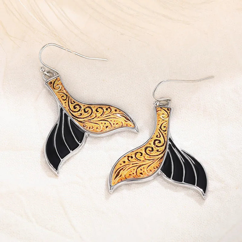 Women's white gold colour alloy fishtail earrings with whale design and retro styling