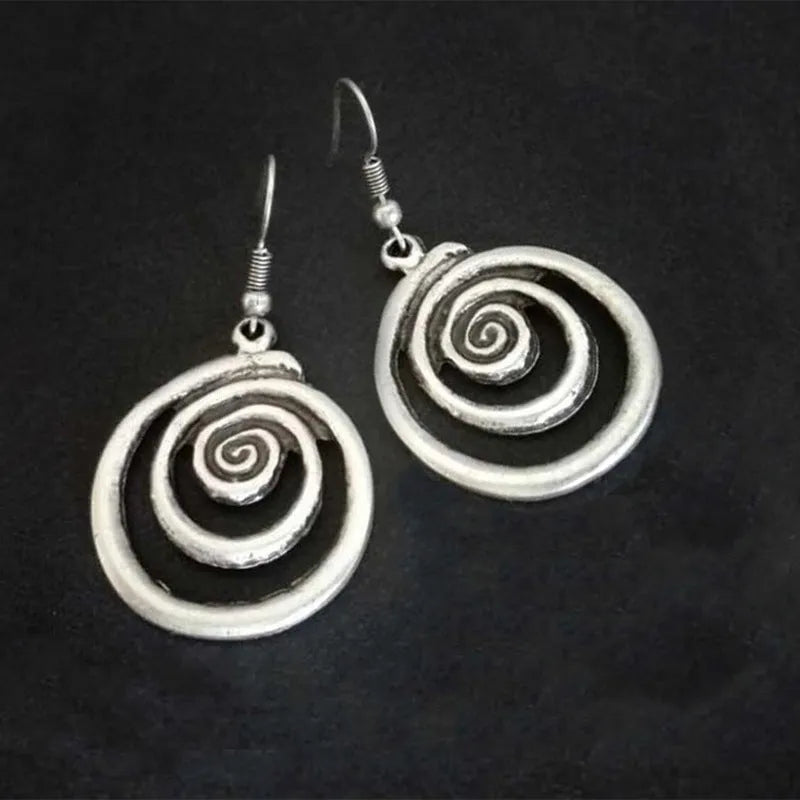 Silver geometric spiral distressed earrings with a retro national style design.