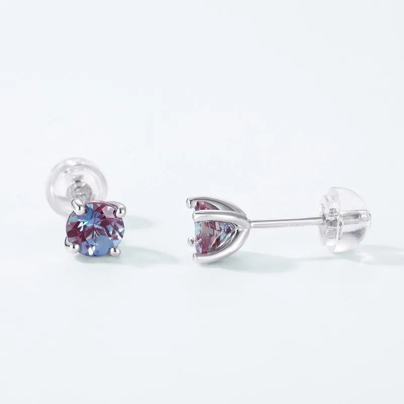 A pair of round geometric stud earrings with a cultivated alexandrite stone set in 925 silver.