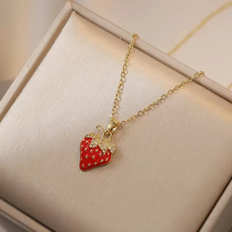 Red delicate indie necklace with cherry charm on a 50cm adjustable titanium steel O-ring chain.