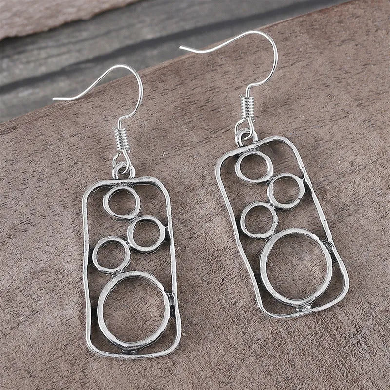 Geometric round earrings in antique silver finish made from zinc alloy for men and women