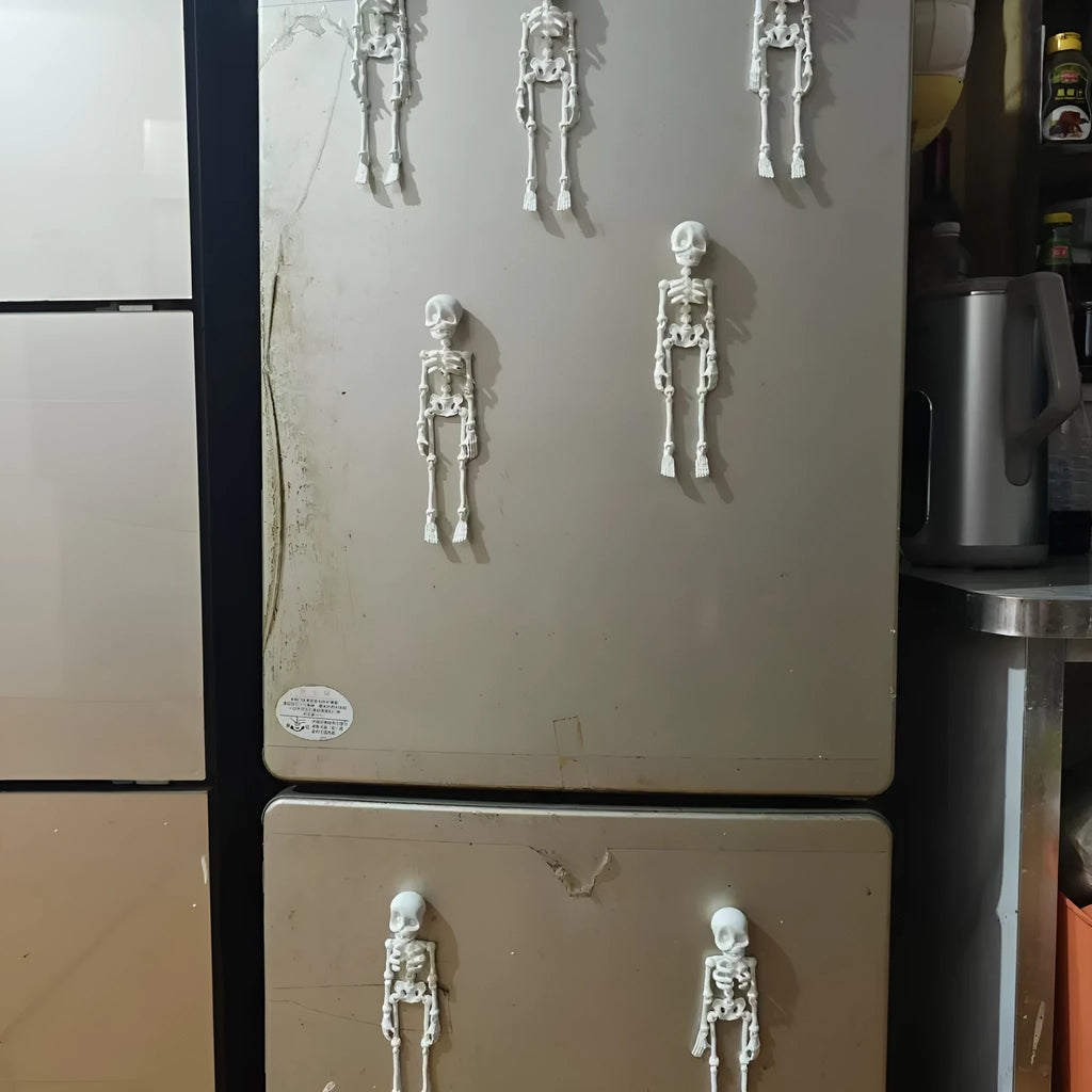 3D printed white skull fridge magnet for Halloween decoration, 18cm tall on a refrigerator.