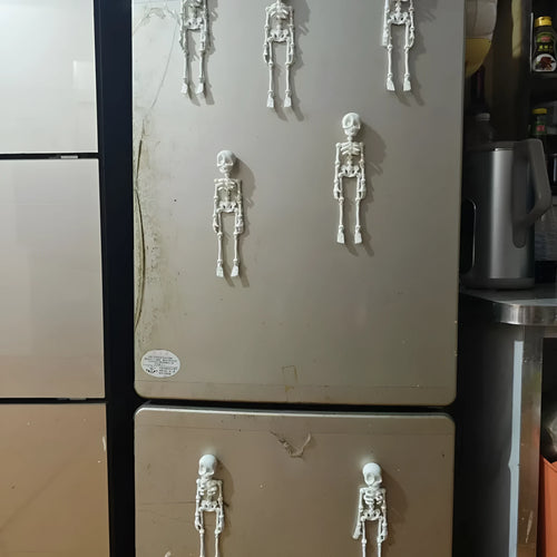 3D printed white skull fridge magnet for Halloween decoration, 18cm tall on a refrigerator.