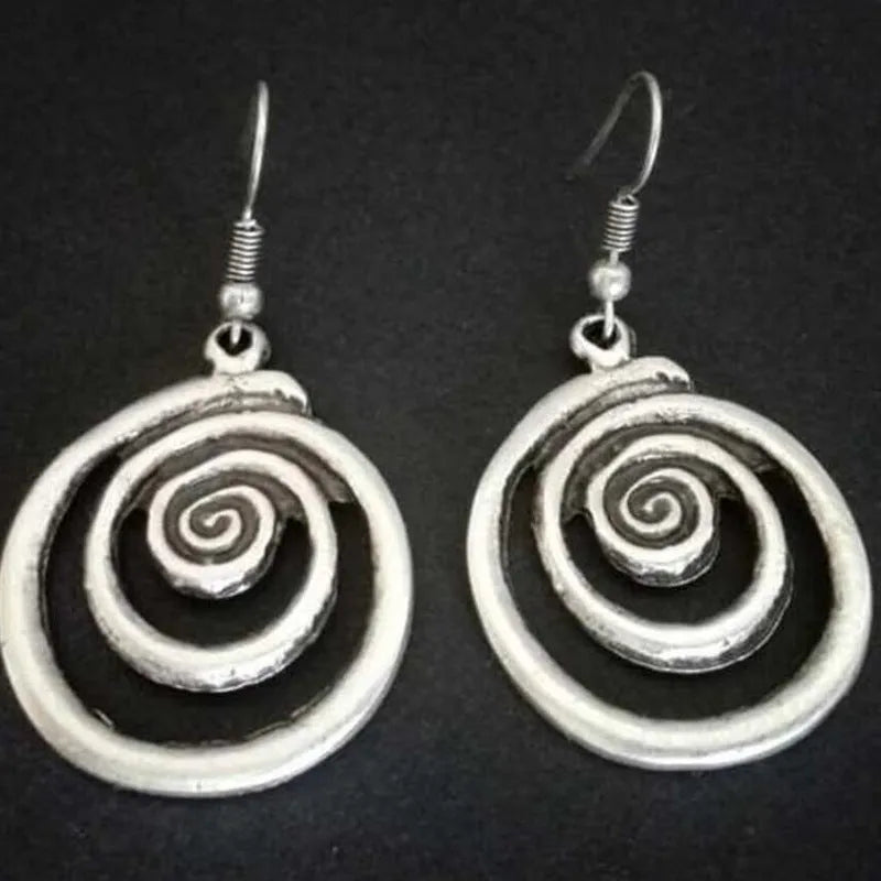 Silver geometric spiral distressed earrings with a retro national style design.