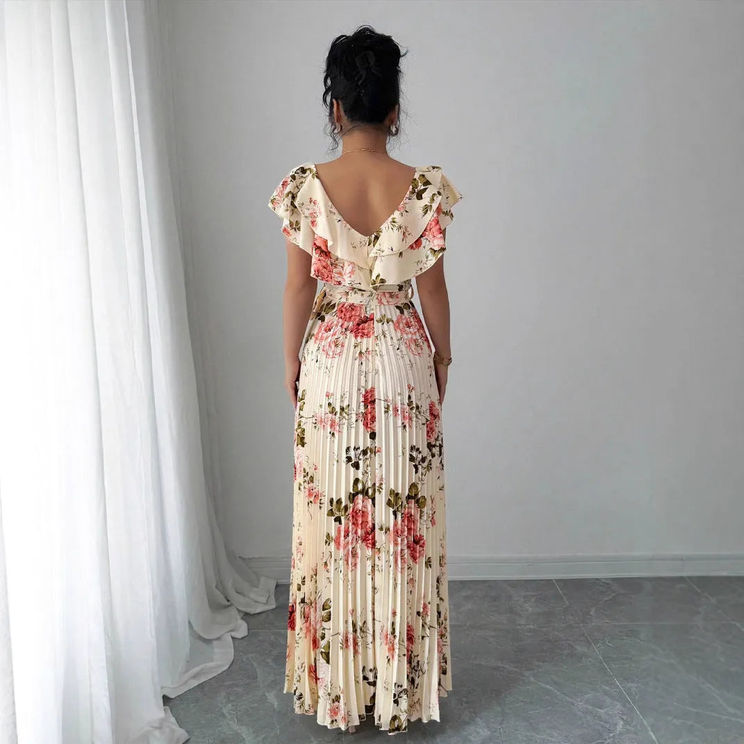Apricot v-neck floral print dress with ruffle sleeves and an oversized swing skirt.