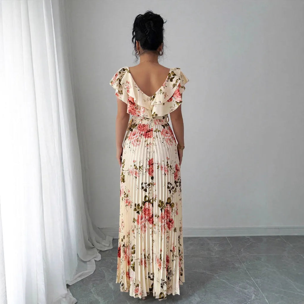 Apricot v-neck dress with digital floral print, ruffled short sleeves, high waist, and oversized swing skirt