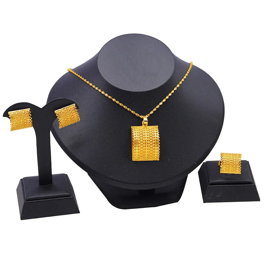 Gold-coloured bridal jewellery set with copper necklace, earrings, and ring for wedding occasions