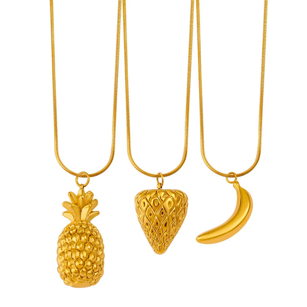 Close-up of a stainless steel watermelon charm pendant on a silver alloy chain, showing textured details.