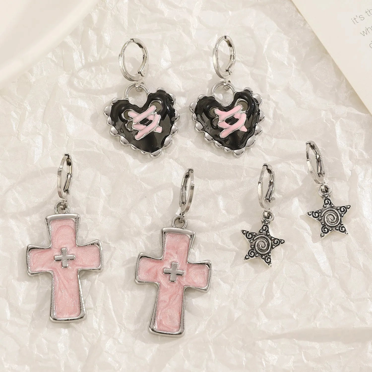 Women's alloy earrings with cross crystal design in antique silver, white, and bright black cat colour options