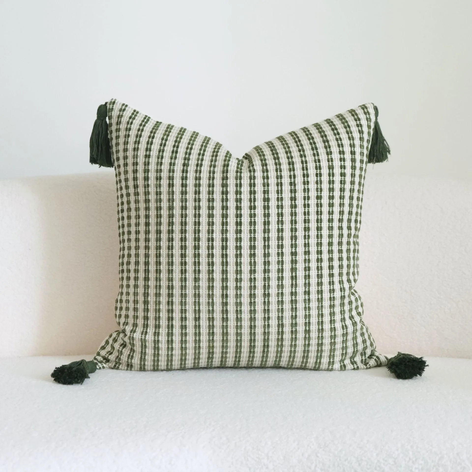 Green cotton and linen hotel sample pillow with silk floss filler in striped and botanical patterns
