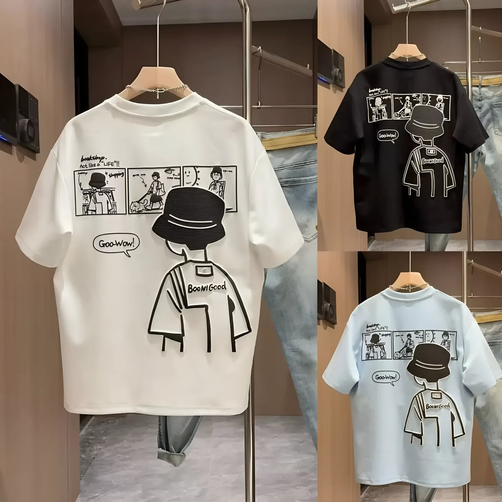 Men's black cotton t-shirt with a cartoon print, showing crew neck and short sleeve design on a hanger.