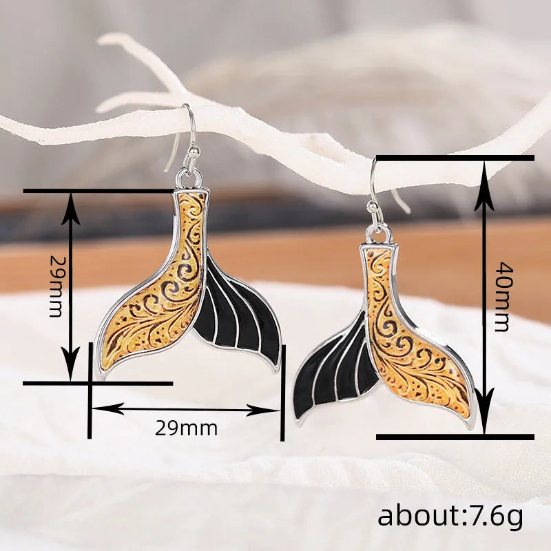 Women's white gold colour alloy fishtail earrings with whale design and retro styling