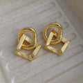 Retro geometric circle pendant earrings with 3.4 cm drop in gold or silver electroplated finish