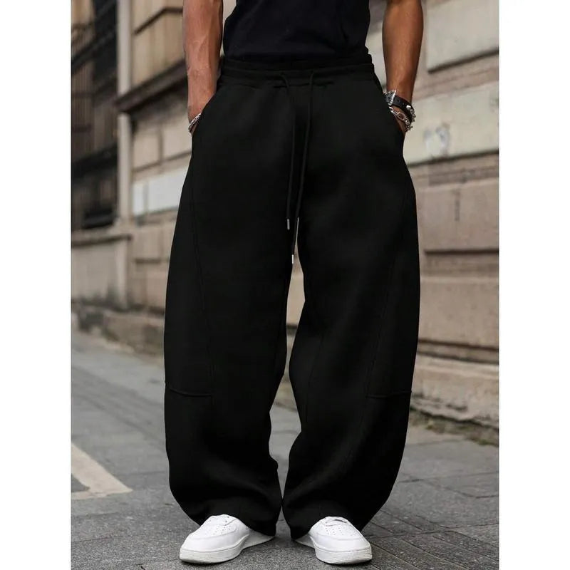 Men's straight-leg high-waist trousers in a cropped length, shown in a dark grey colour.