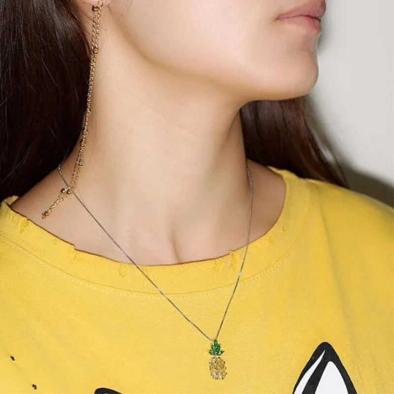 Silver-plated women's necklace with a geometric pineapple diamond charm in a copper white gold finish.