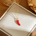Delicate titanium steel necklace with fruit charms including cherry, strawberry, and pepper pendants with zircon accents