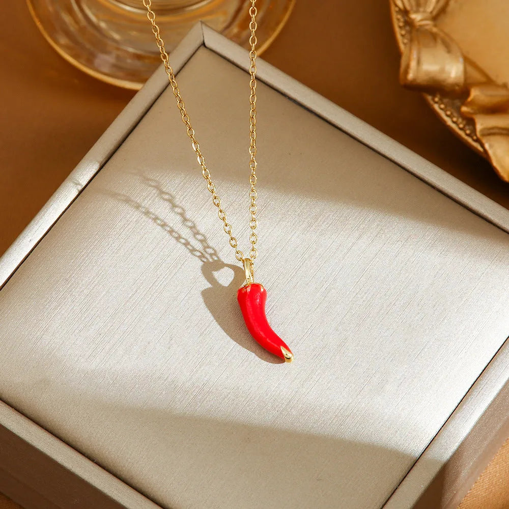 Delicate titanium steel necklace with fruit charms including cherry, strawberry, and pepper pendants with zircon accents