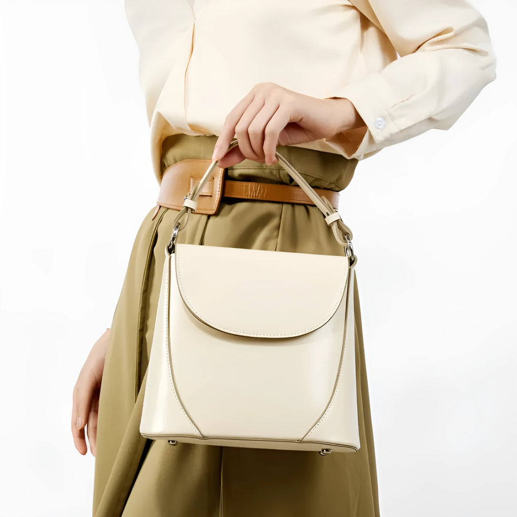 Genuine leather square shoulder bag 22x10x20 cm in beige with visible sewing thread detail and single shoulder strap
