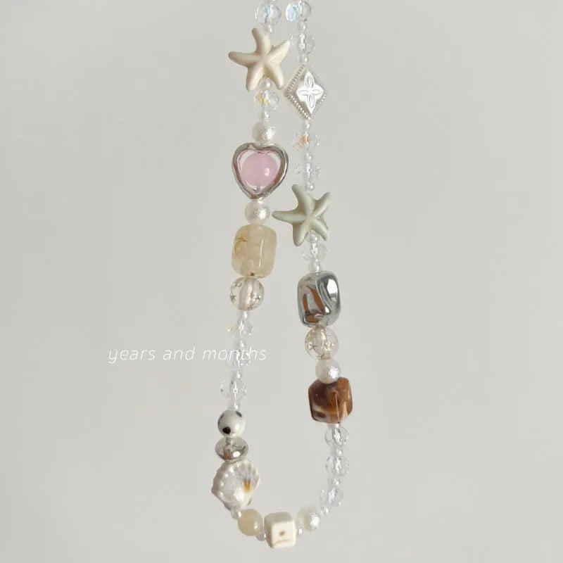 Island sweetheart coloured alloy beaded mobile phone charm with bohemian style