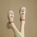 Women's beige renewable leather platform sandals with chunky heels and open toe design