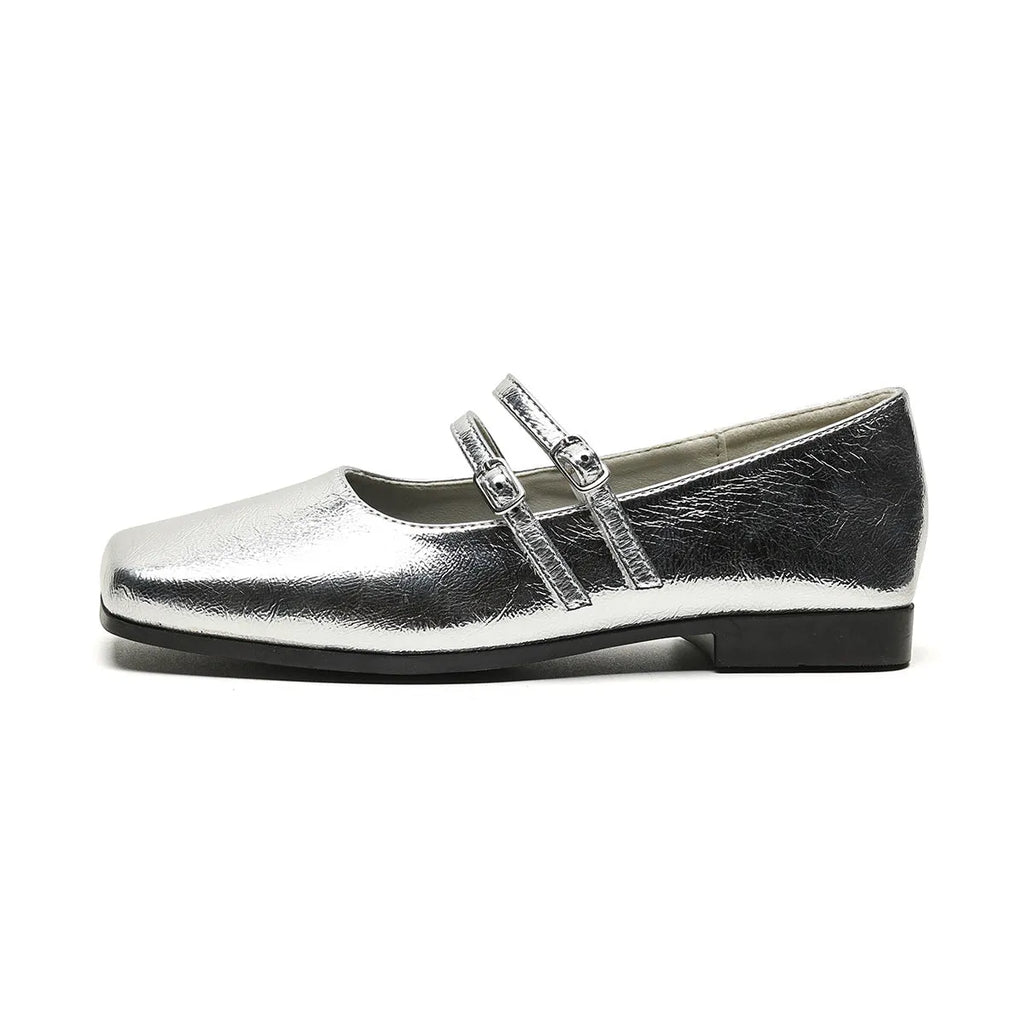 Women's silver genuine leather Mary Jane shoes with a cross buckle strap and flat sole.