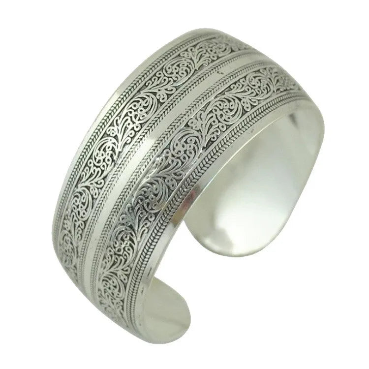 Ethnic carved open Miao silver bracelet with Roman shape in turtle colour option showing detailed openwork carving