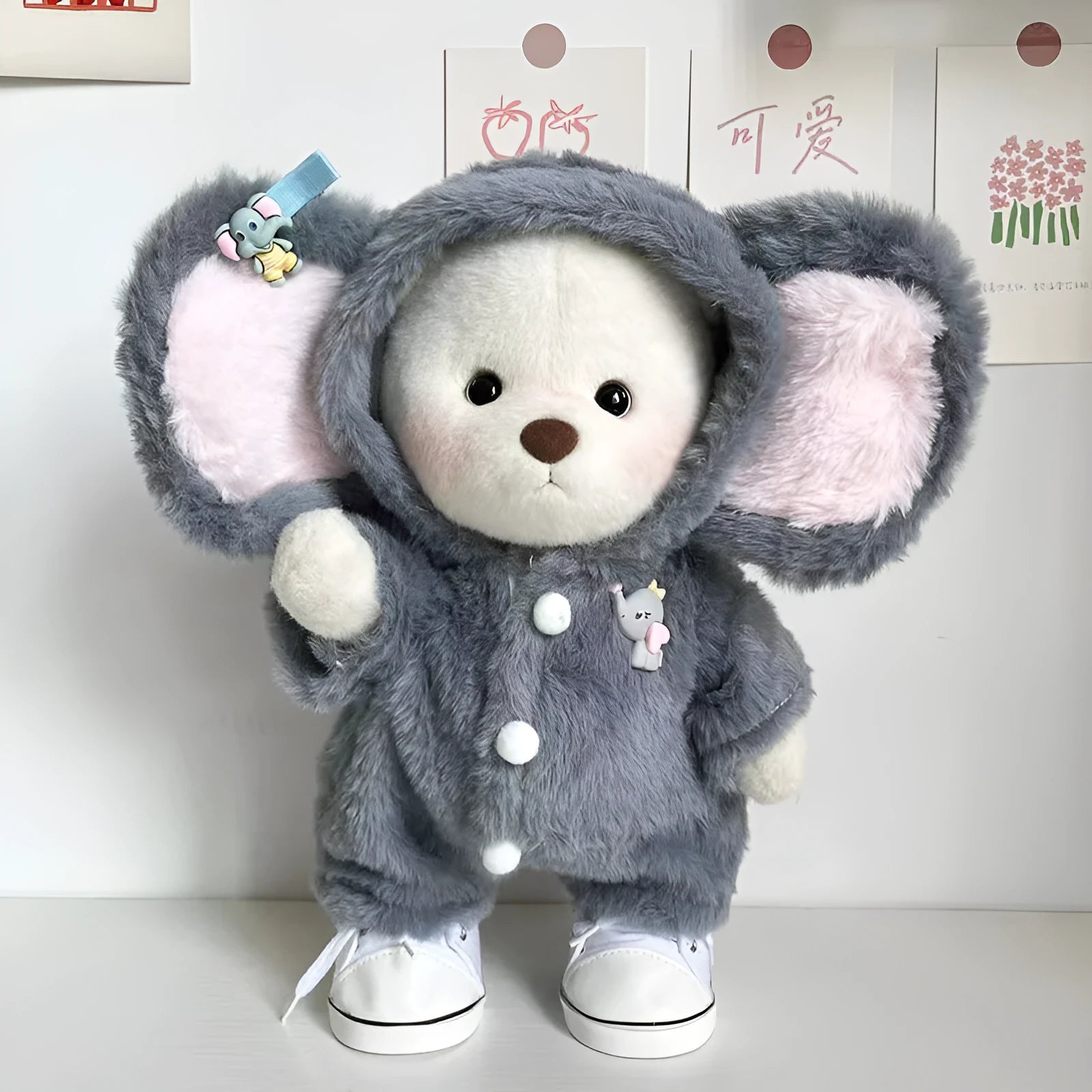 Grey elephant pattern one-piece jumpsuit for a 30cm tall plush teddy bear doll.