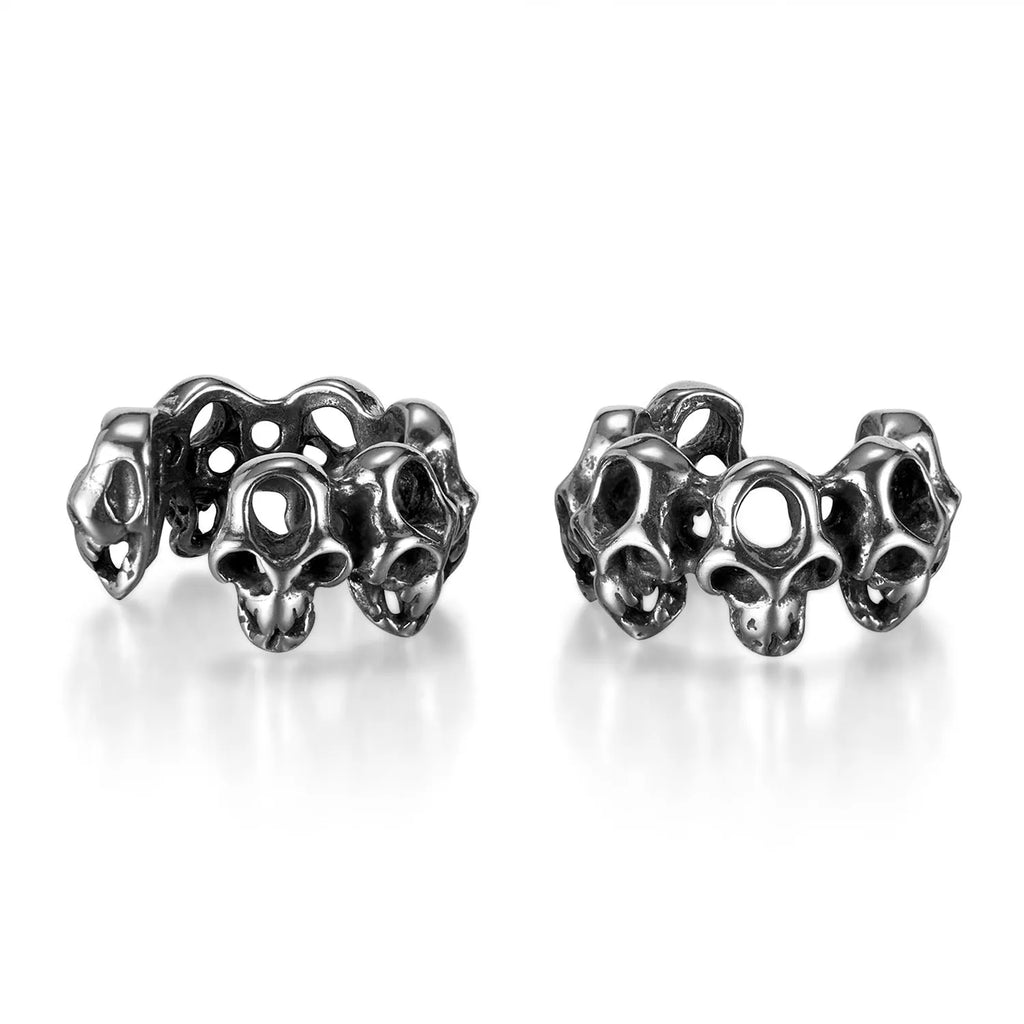Stainless steel skull ear clips with hollow geometric design and clip-on backing