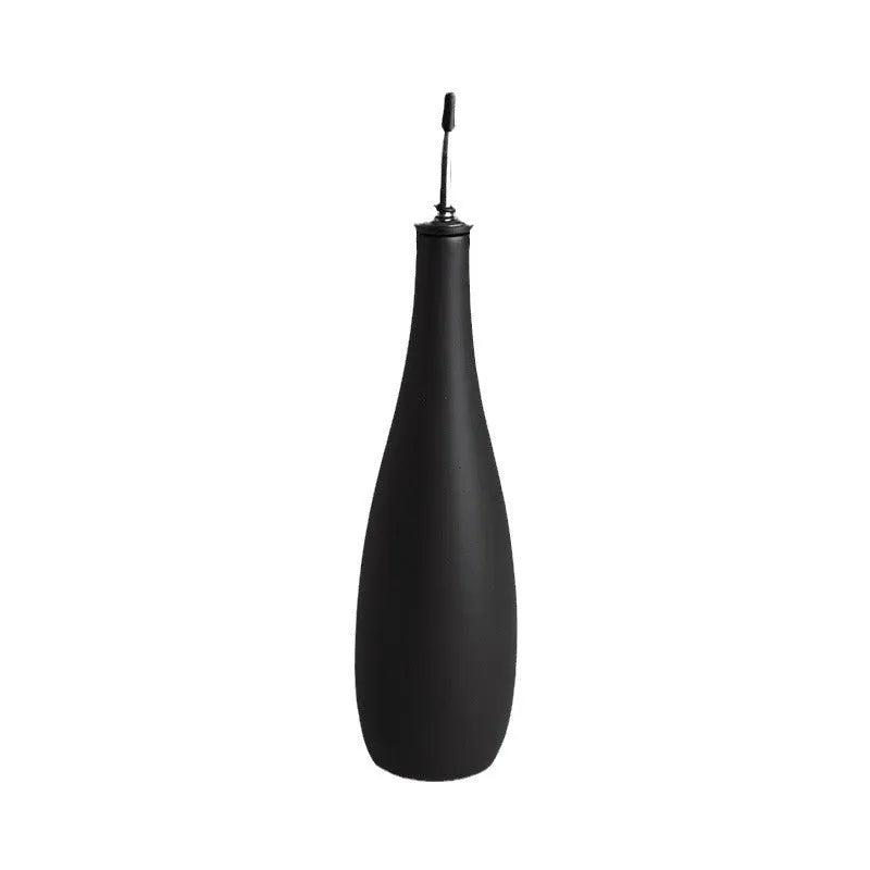 Ceramic oil pot with integrated funnel for kitchen oil storage in 650ml capacity