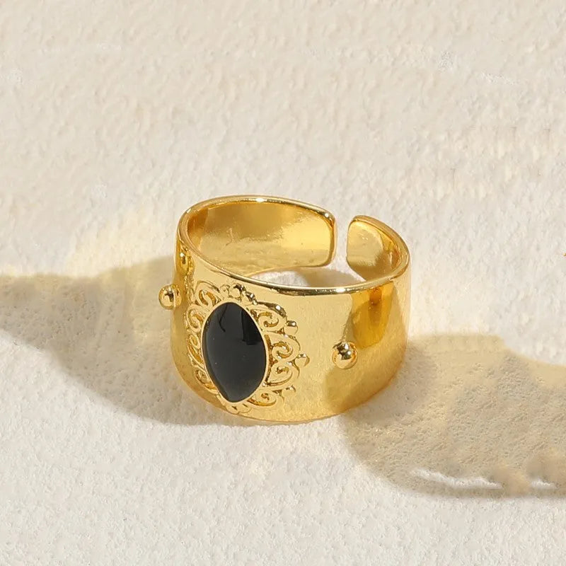 Geometric Chinese style ring with zircon stones in horse eye black colour on copper base