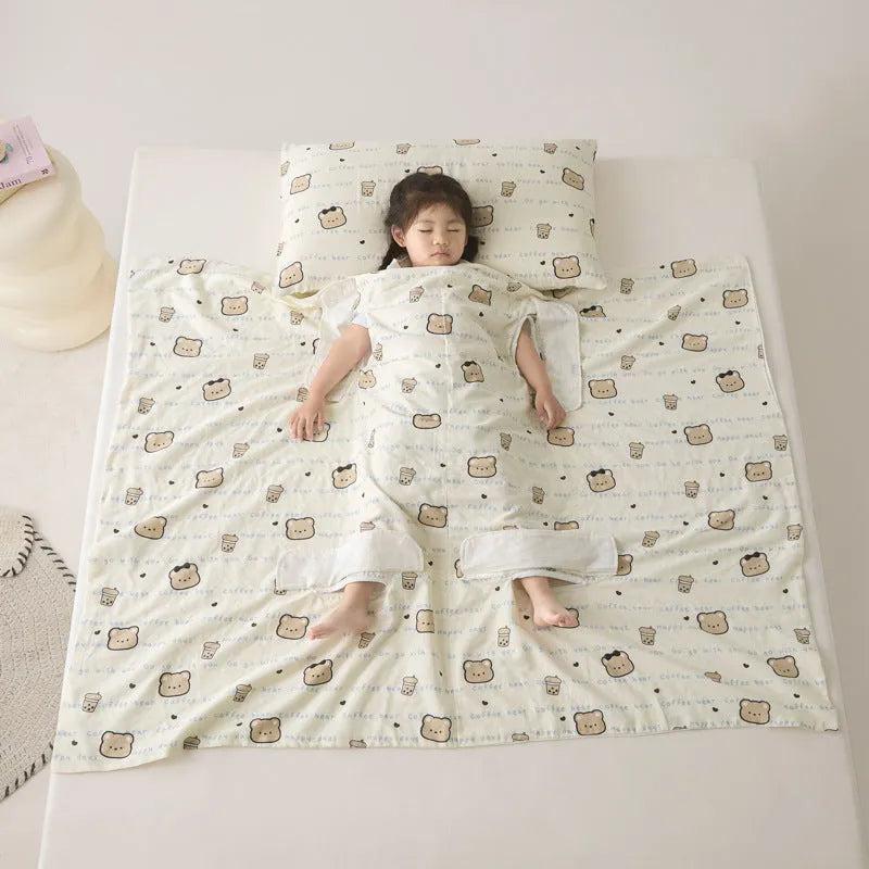 Anti-kick sleeping bag blanket in a choice of colours and sizes on a bed.