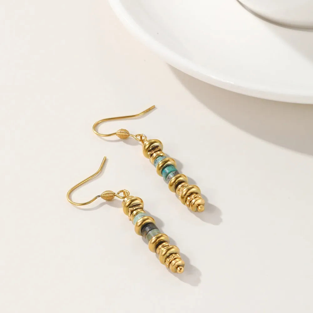 Geometric dangle earrings with gold plating and retro design