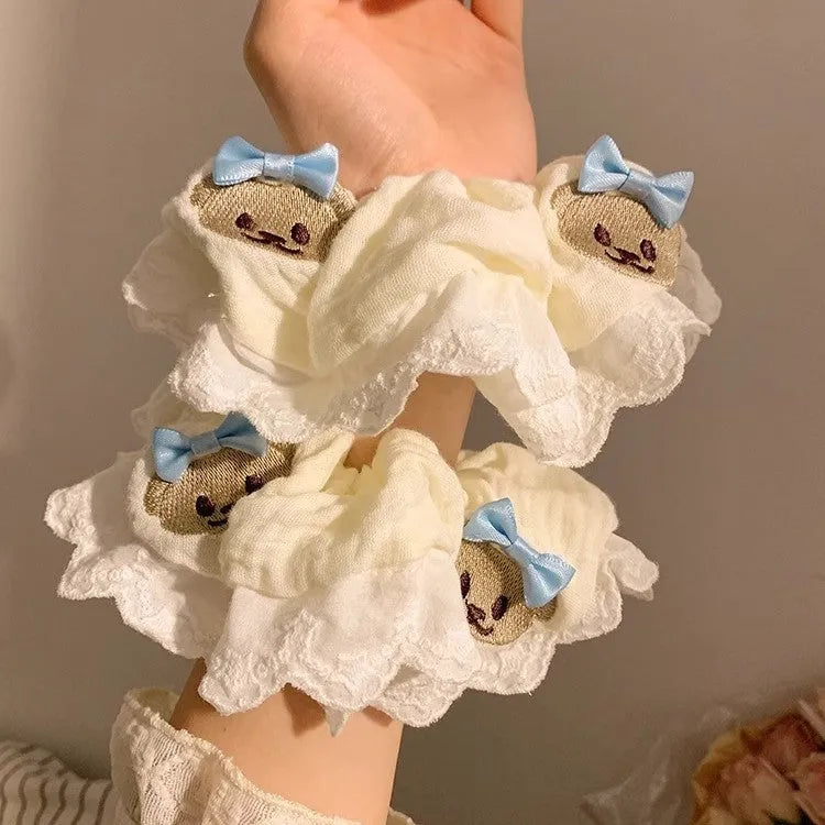 Blue bear-themed cloth headband with bow lace decoration and elastic design